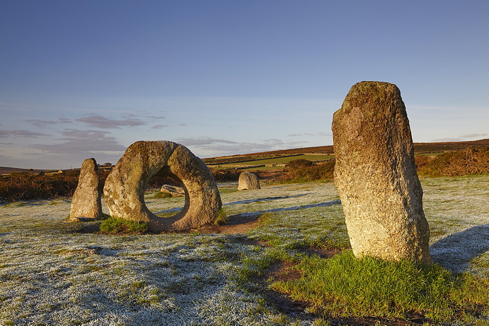 The mysterious prehistoric Men-an-Tol ring stone on a frosty morning, in a field near Penzance, in west Cornwall, England, United Kingdom, Europe