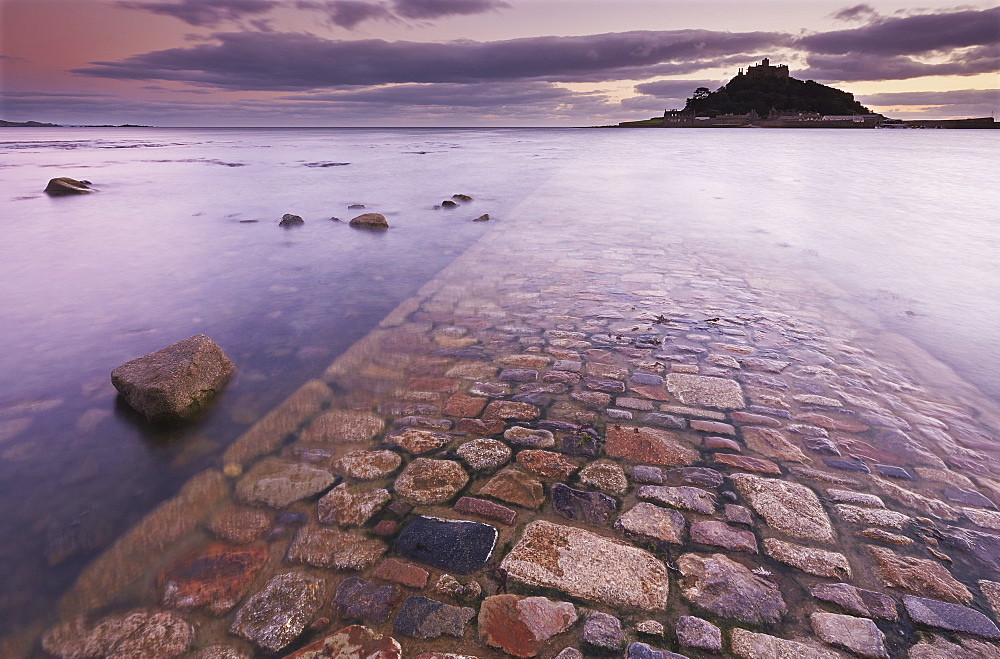 A dusk view of St. Michael's Mount, one of Cornwall's most iconic landmarks, in Marazion, near Penzance, in west Cornwall, England, United Kingdom, Europe