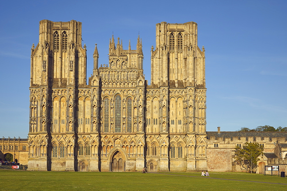 The historic western facade of Wells Cathedral, with its twin square towers, in Wells, Somerset, England, United Kingdom, Europe