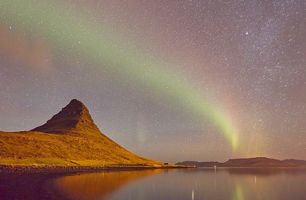 The Aurora Borealis (Northern Lights) seen in the night sky above Grundarfjordur, the Snaefellsnes peninsula, west Iceland, Polar Regions