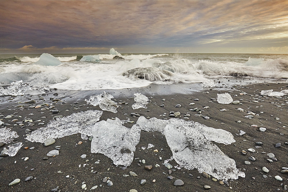 Melting glacial ice, carved from the Vatnajokull icecap, on the beach at Jokulsarlon, on the south coast of Iceland, Polar Regions