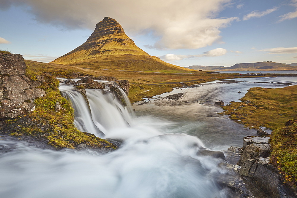 One of Iceland's iconic landscapes, Mount Kirkjufell and Kirkjufellsfoss Falls, near Grundarfjordur, Snaefellsnes peninsula, Iceland, Polar Regions