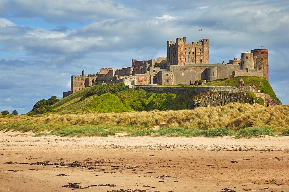 Bamburgh Castle and its beach, at Bamburgh, near Seahouses, Northumberland, England, United Kingdom, Europe