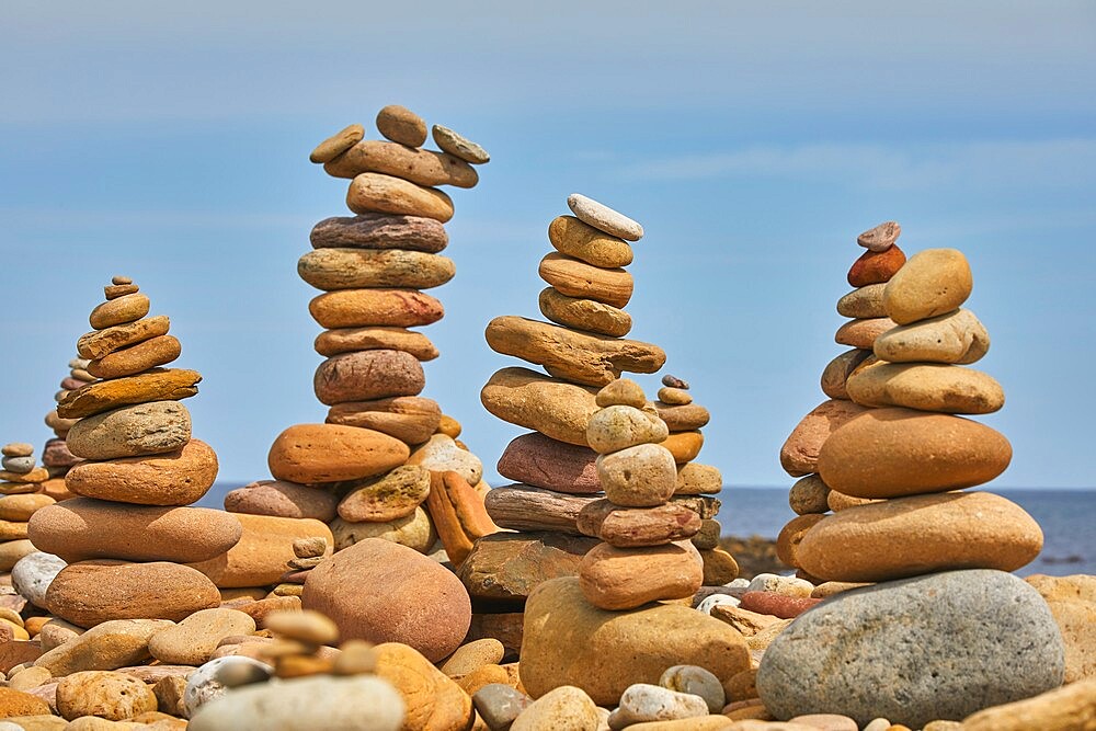 Stone trolls piled up on the shore at Lindisfarne, Holy Island, Northumberland, northeast England, United Kingdom, Europe