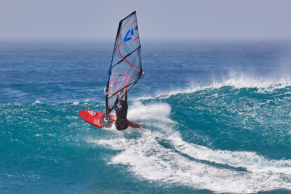 Wind-surfing on Atlantic rollers at Ponta Preta, southwest coast of Sal, Cape Verde Islands, Atlantic, Africa