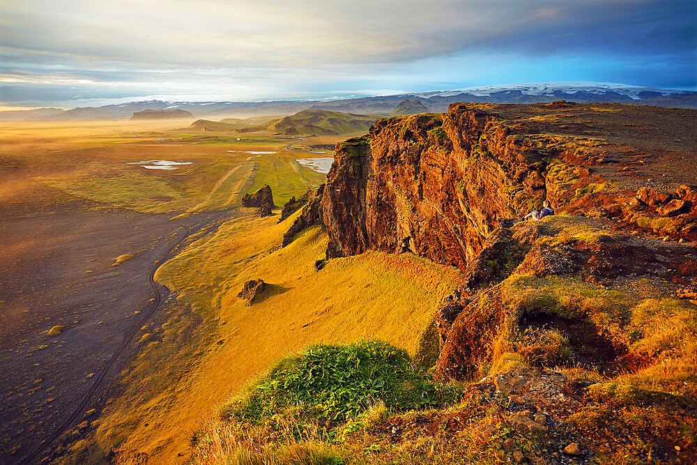 Cliff and mountain view from Dyrholaey Island, just before sunset, near Vik, south coast of Iceland, Polar Regions