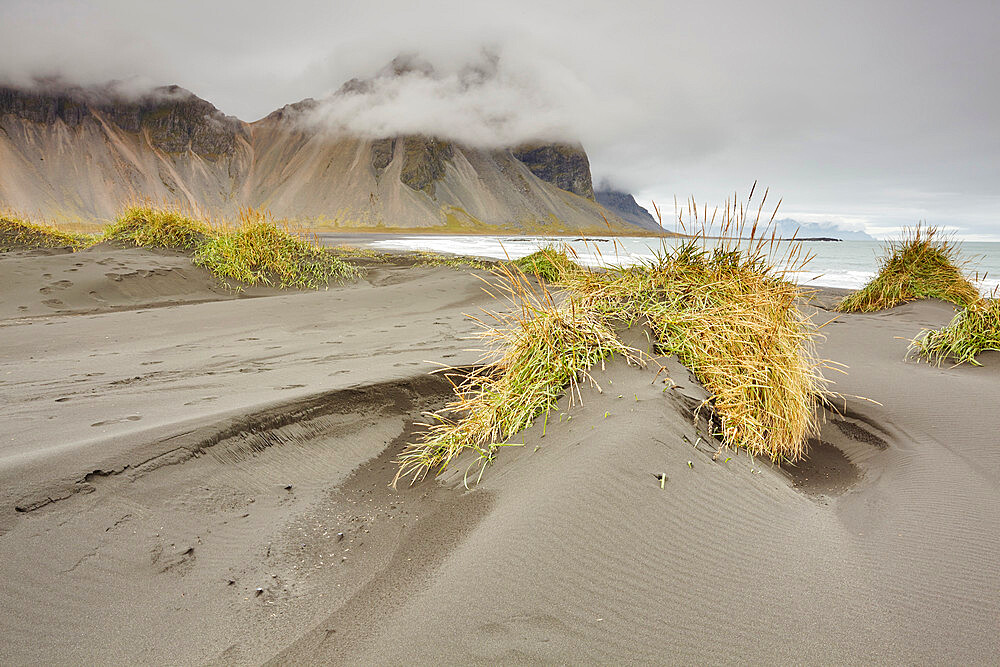 The black sand dunes and cliffs of Vestrahorn seen from Stokksnes, near Hofn, southeast Iceland, Polar Regions