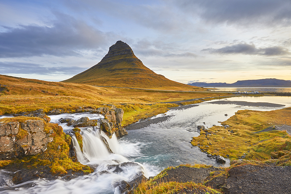 Mount Kirkjufell and Kirkjufellsfoss Falls, near the port of Grundarfjordur, Snaefellsnes peninsula, western Iceland, Polar Regions