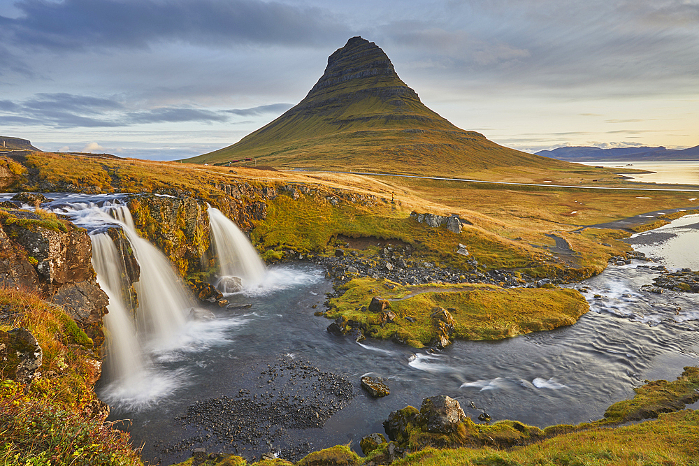 Mount Kirkjufell and Kirkjufellsfoss Falls, near the port of Grundarfjordur, Snaefellsnes peninsula, western Iceland, Polar Regions