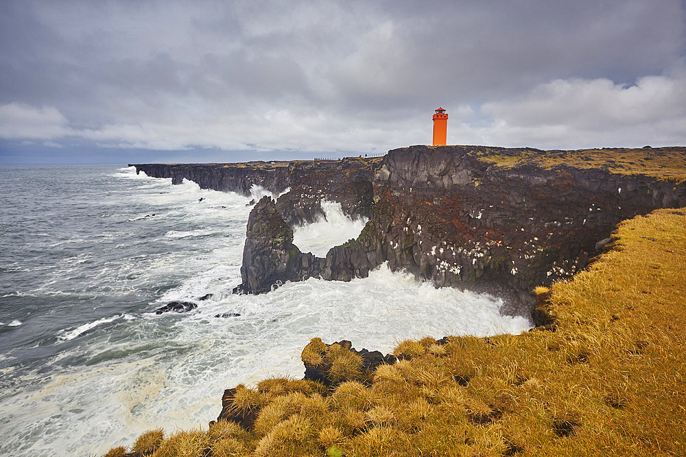 Storm surf against lava cliffs at Skalasnagi, in Snaefellsjokull National Park, the northwestern tip of the Snaefellsnes peninsula, on the west coast of Iceland, Polar Regions