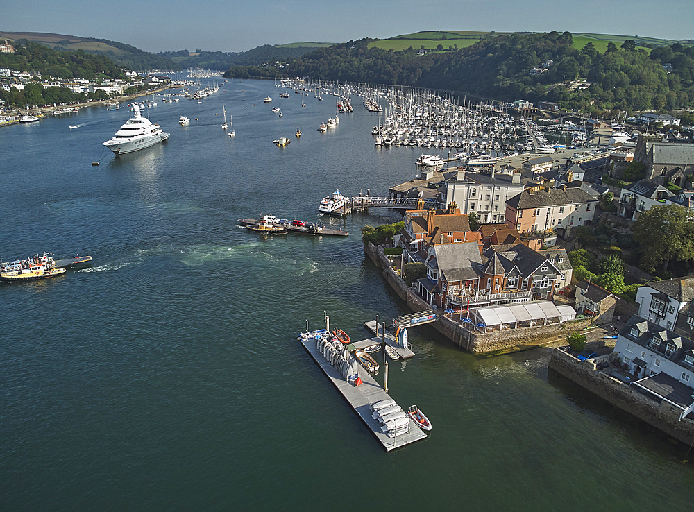 An aerial view of the estuary of the River Dart, with the towns of Dartmouth on the left and Kingswear on the right, on the south coast of Devon, England, United Kingdom, Europe