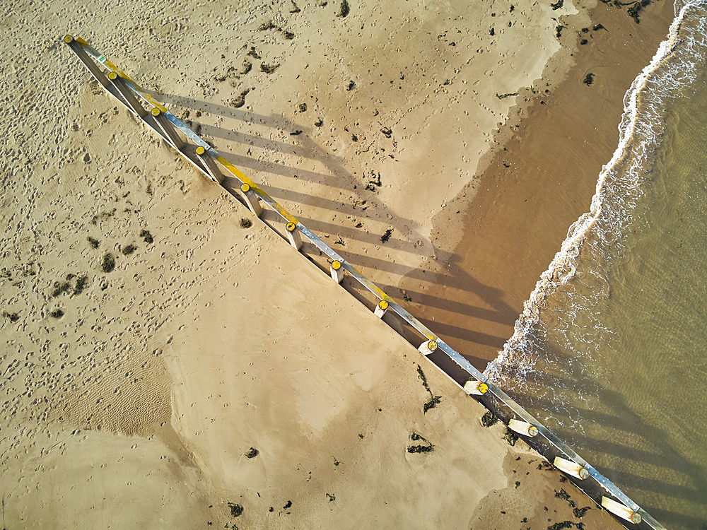 Aerial view of a groyne on the sandy beach at Dawlish Warren, near the seaside town of Dawlish, Devon, England, United Kingdom, Europe