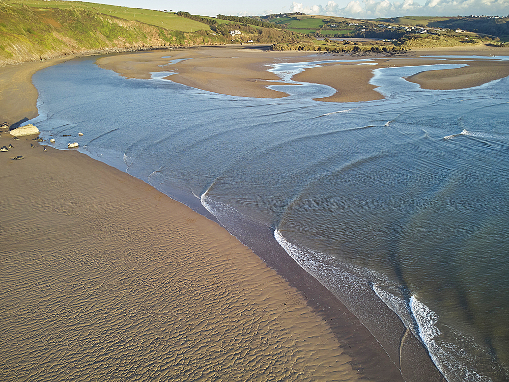 An aerial view of sand banks at low tide, in the mouth of the River Avon, at Bigbury, on the south coast of Devon, England, United Kingdom, Europe