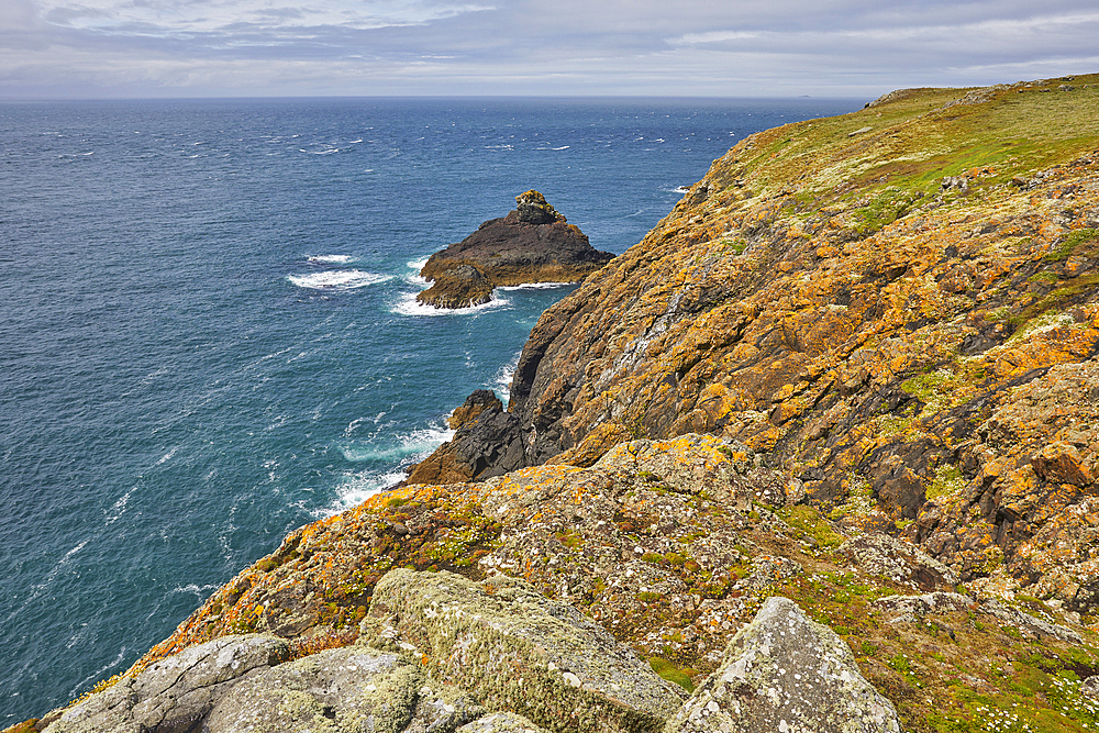 The cliffs at Skomer Head, on the west coast of Skomer Island, a nature reserve off the coast of Pembrokeshire, Wales, United Kingdom, Europe