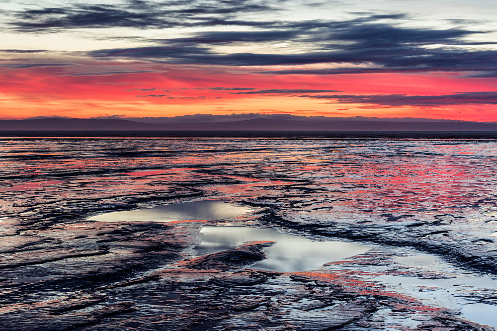 Brean Beach at sunset, mud and the Bristol Channel, Somerset, England, United Kingdom, Europe