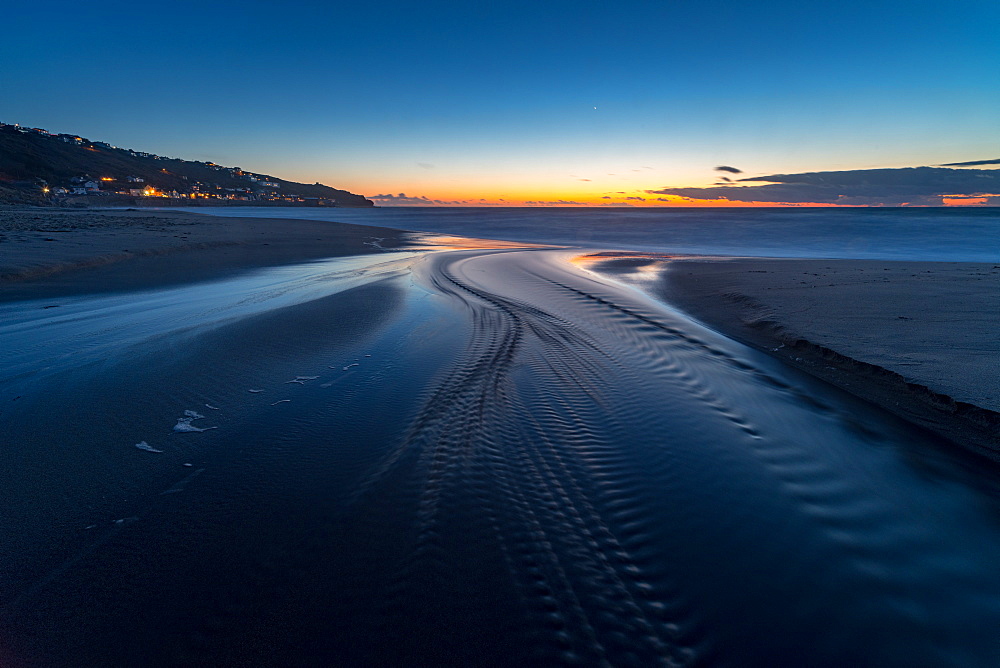 Water trails at sunset, Sennen Beach, Sennen, Cornwall, England, United Kingdom, Europe