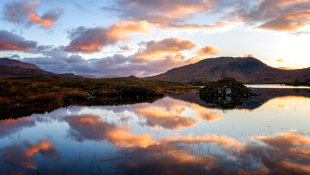 Sunset view across Lochain na h'achlaise at dawn, Rannoch Moor, Highland, Scotland, United Kingdom, Europe