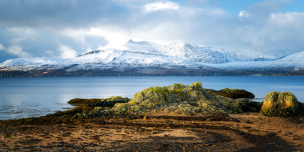 Cuillin Mountain range in the snow from Ord Beach, Isle of Skye, Inner Hebrides, Scotland, United Kingdom, Europe