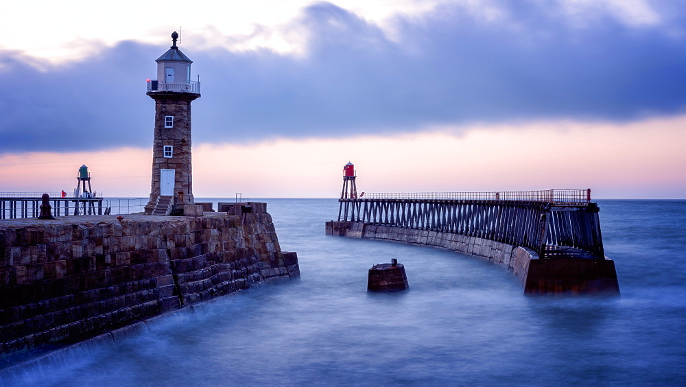 Whitby Pier at sunset, Yorkshire, England, United Kingdom, Europe