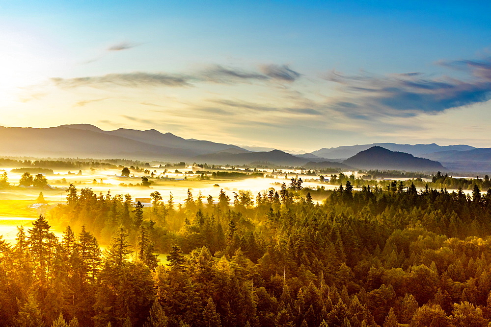 Aerial view of sunrise over Mount Rainier National Park, Washington State, United States of America, North America