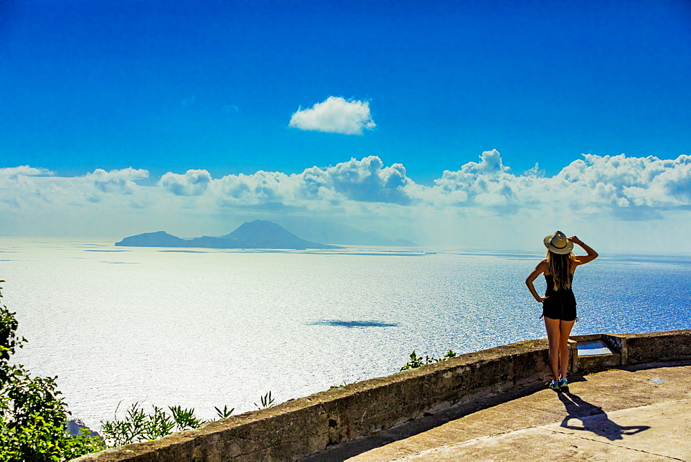 Woman taking in the captivating view at the top of Saba Island, Netherlands Antilles, West Indies, Caribbean, Central America