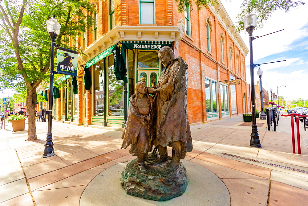 A statue of a Sioux Native American woman and her daughter in downtown Rapid City, South Dakota, United States of America, North America