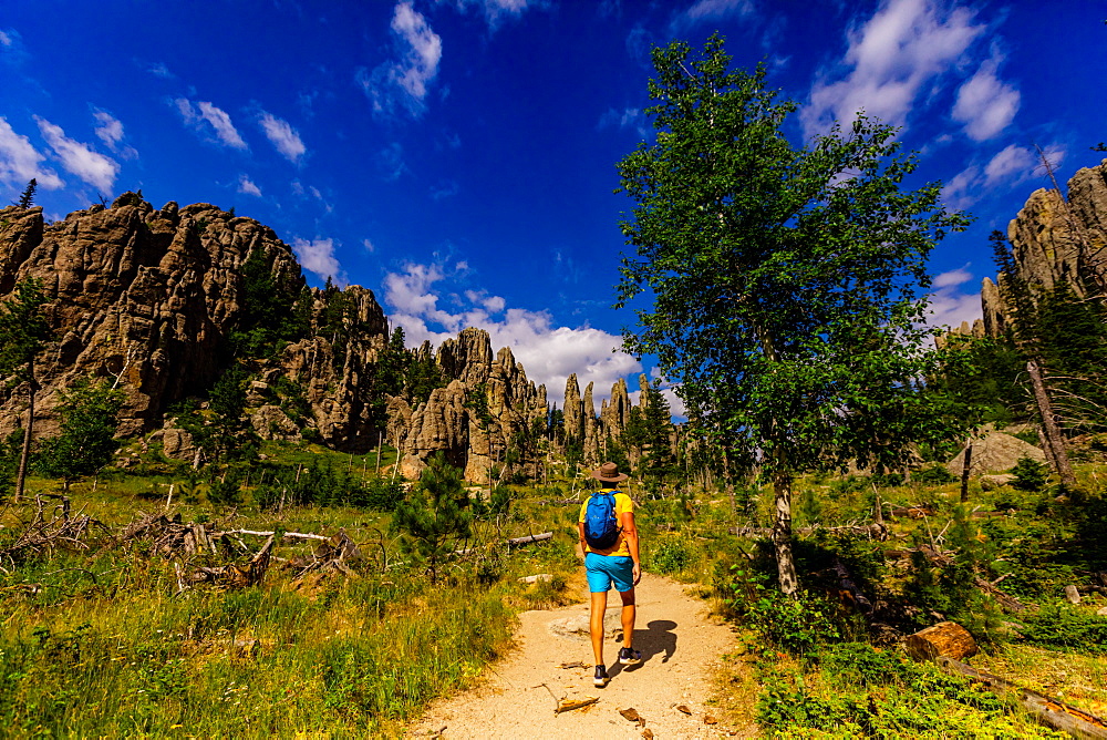 Man hiking the trails and enjoying the sights in the Black Hills of Keystone, South Dakota, United States of America, North America