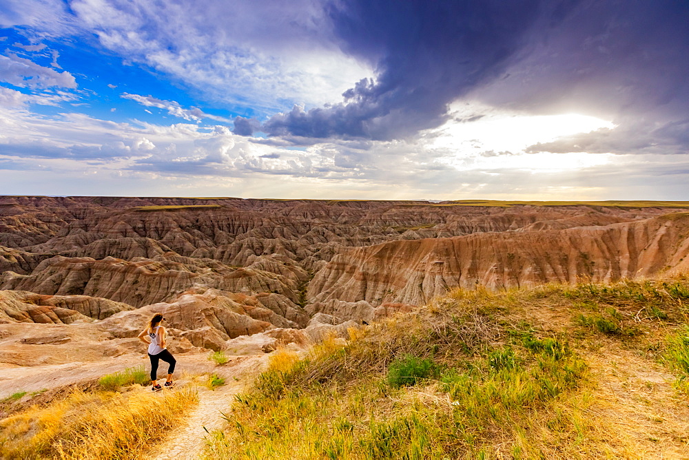 Woman hiking her way through the scenic Badlands, South Dakota, United States of America, North America