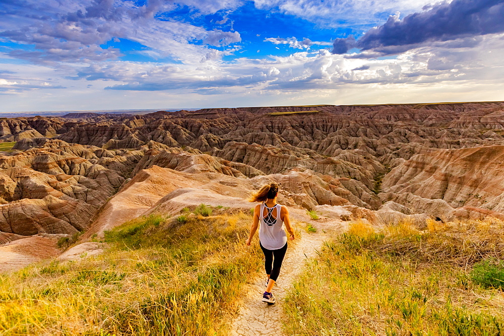 Woman hiking her way through the scenic Badlands, South Dakota, United States of America, North America