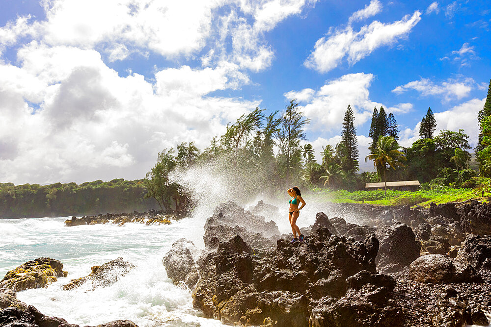 Woman enjoying the oceanside on Maui, Hawaii, United States of America, North America