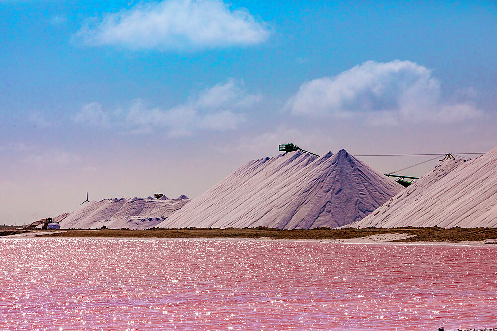 Pink colored ocean overlooking the Salt Pyramids of Bonaire, Netherlands Antilles, Caribbean, Central America