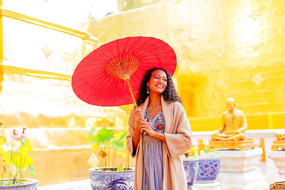 Woman at Wat Phra Singh Woramahawihan, Chiang Mai, Thailand, Southeast Asia, Asia