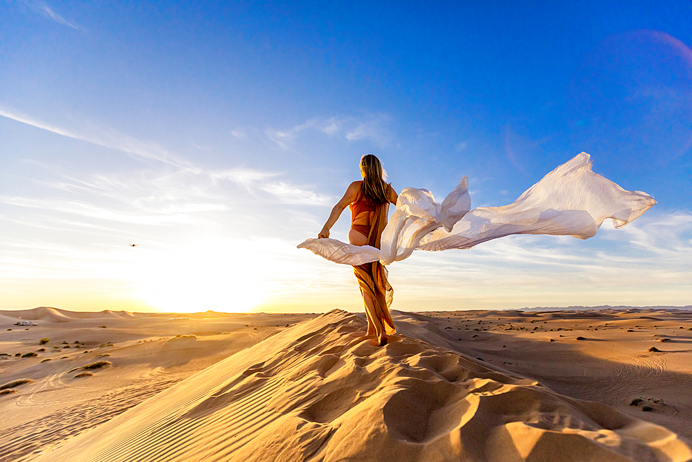 Ethereal woman at the Imperial Sand Dunes, California, United States of America, North America