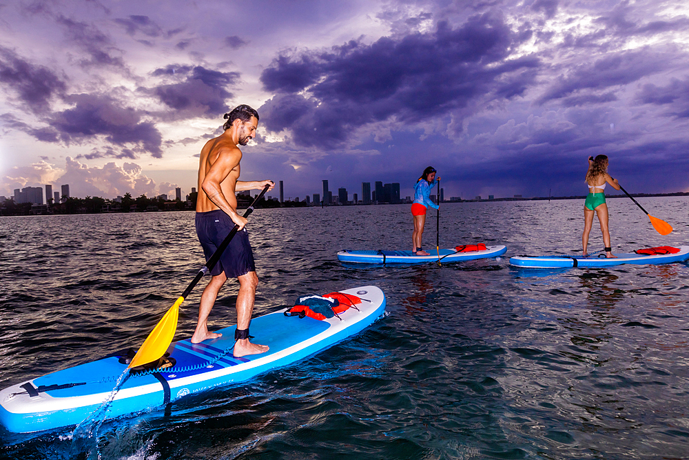 Paddleboarding off Miami Beach, Florida, United States of America, North America