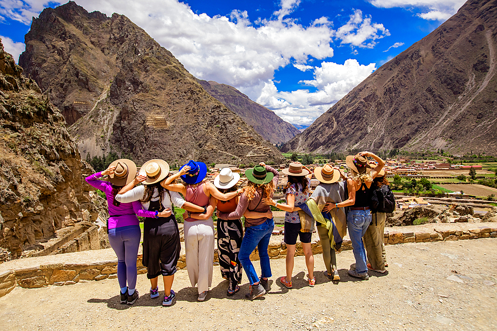 Women looking out over Ollantaytambo, Peru, South America