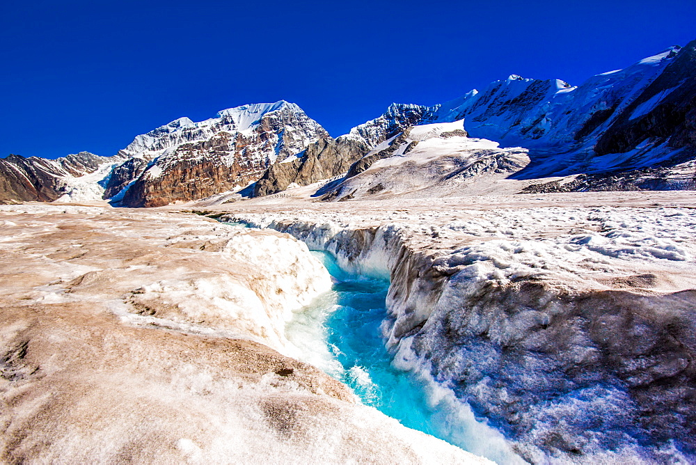 Helicopter landing on West Fork Glacier in Alaska, United States of America, North America