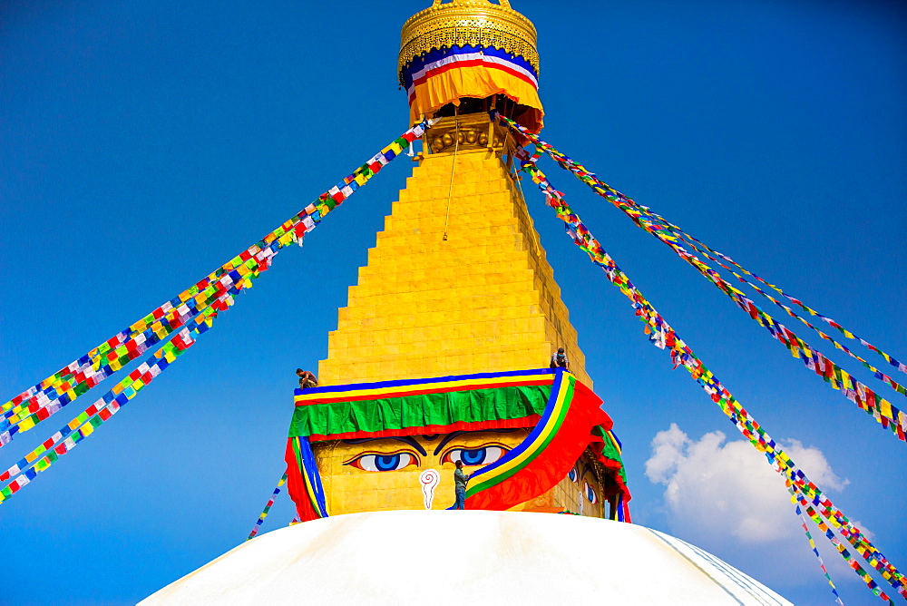 Buddhist Monks decorating the temple at Bouddha (Boudhanath), UNESCO World Heritage Site, Kathmandu, Nepal, Asia