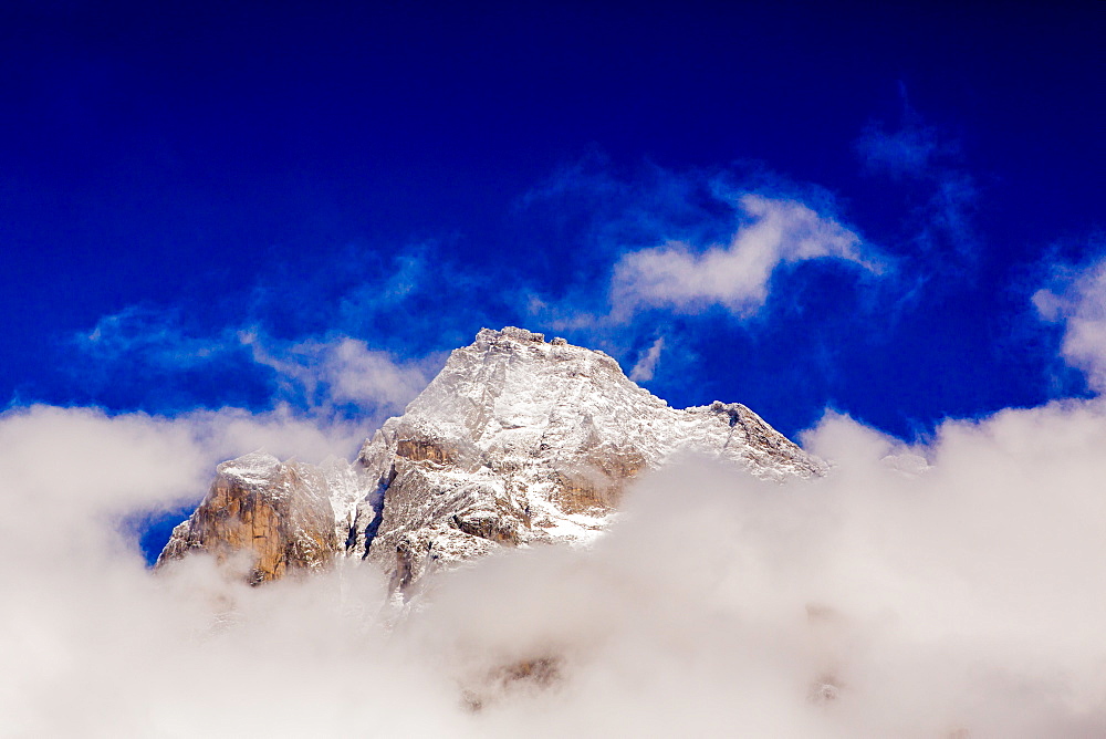 Peak of Mount Everest peeking through the clouds, Sagarmartha National Park, UNESCO World Heritage Site, Himalayas, Nepal, Asia