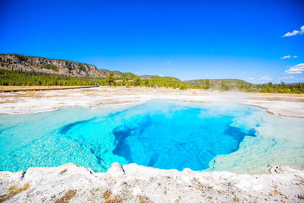 Rainbow Geyser and surreal the colors that the different bacteria create in these geysers, Yellowstone National Park, UNESCO World Heritage Site, Wyoming, United States of America, North America