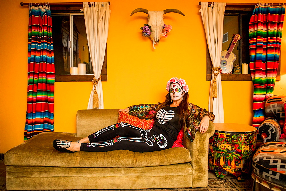 Woman in Dia de los Muertos makeup and costume, Day of the Dead celebration in the desert, California, United States of America, North America