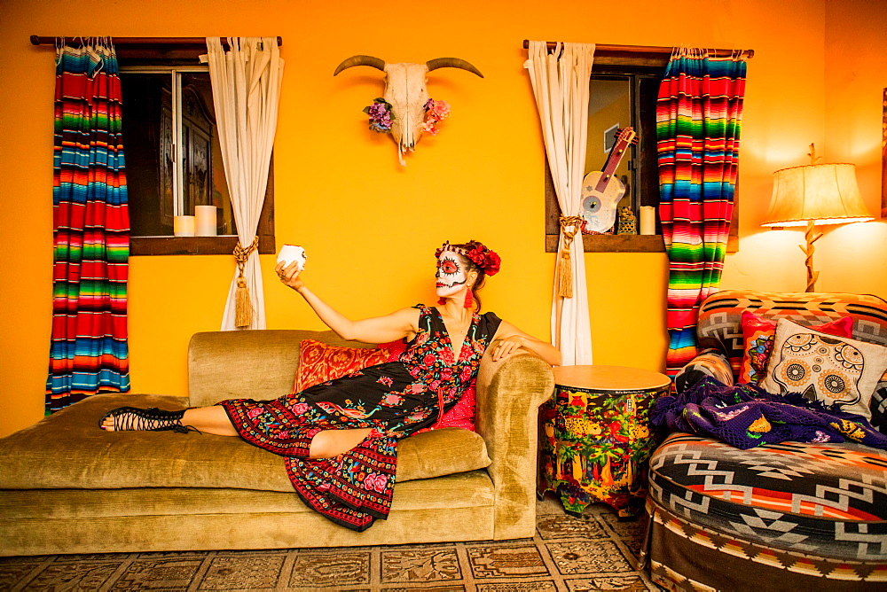 Woman in Dia de los Muertos makeup and costume, Day of the Dead celebration in the desert, California, United States of America, North America