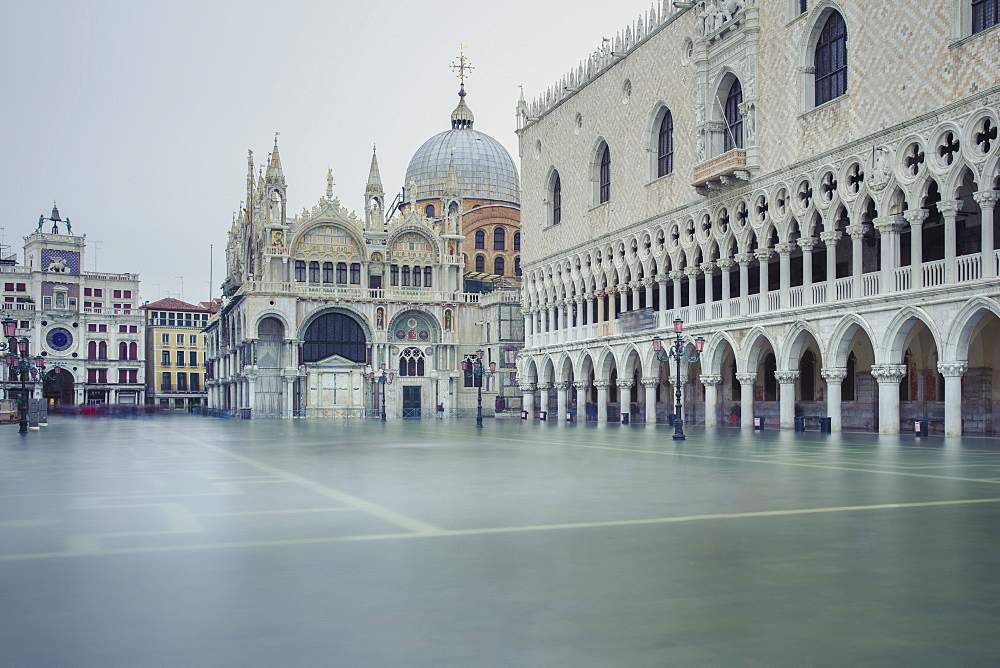 A flooded Piazetta di San Marco after high tide (acqua alta) surrounded by the Doge's Palace and St. Mark's Basilica, Venice, UNESCO World Heritage Site, Veneto, Italy, Europe