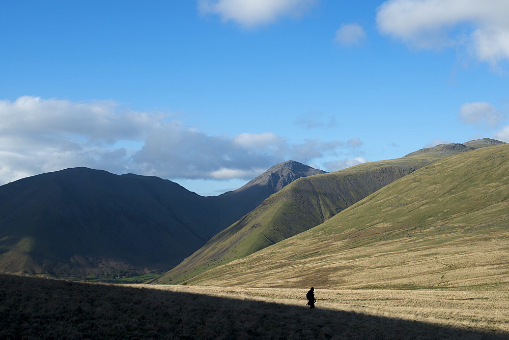 Trekking in the English Lake District in Wasdale with views of Kirk Fell and Great Gable in the distance, Lake District National Park, Cumbria, England, United Kingdom, Europe