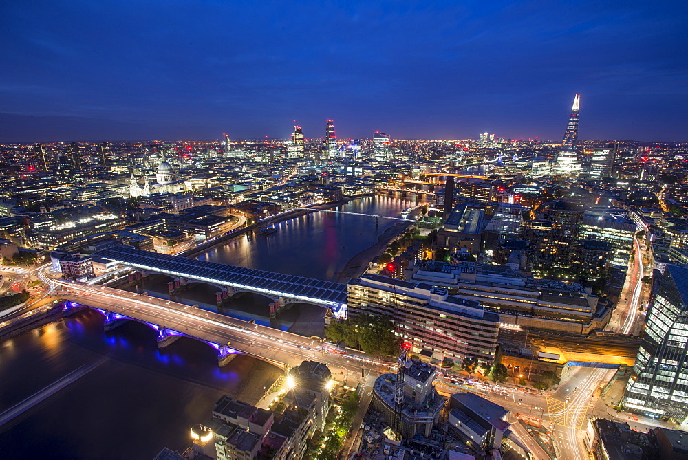 A night-time view of London and the River Thames from the top of Southbank Tower including The Shard, St. Paul's Cathedral and Tate Modern, London, England, United Kingdom, Europe