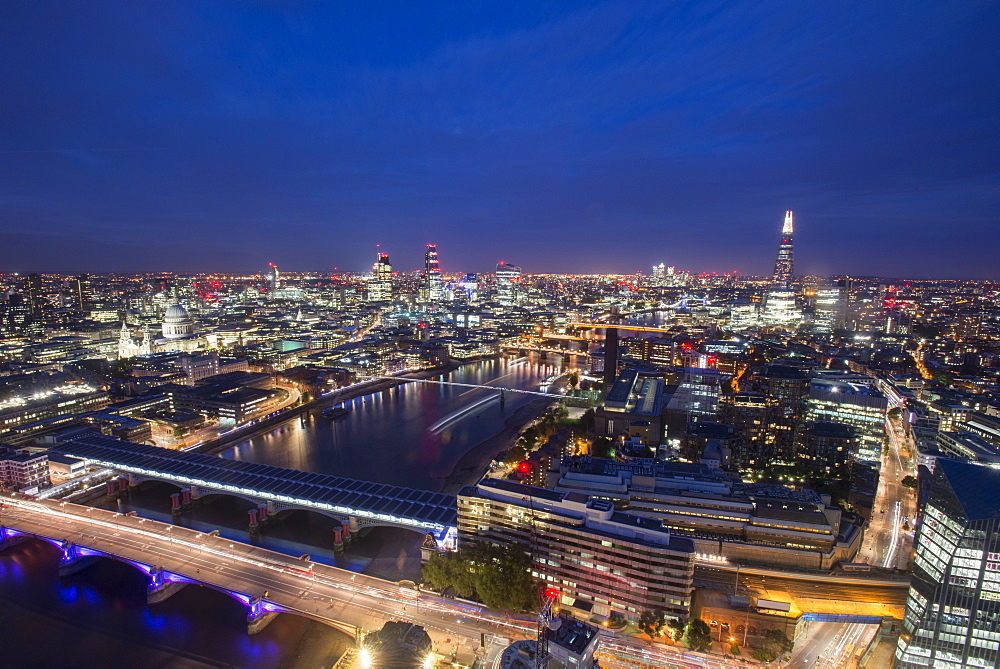 A night-time view of London and the River Thames from the top of Southbank Tower including The Shard, St. Paul's Cathedral and Tate Modern, London, England, United Kingdom, Europe