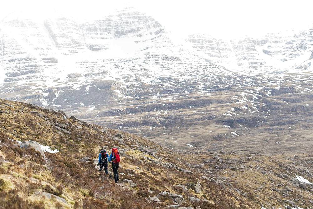 Hiking in the Scottish Highlands in Torridon along The Cape Wrath Trail towards Loch Coire Mhic Fhearchair, Highlands, Scotland, United Kingdom, Europe