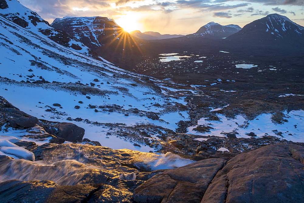 Hiking in the Scottish Highlands in Torridon along The Cape Wrath Trail near Loch Coire Mhic Fhearchair, Highlands, Scotland, United Kingdom, Europe