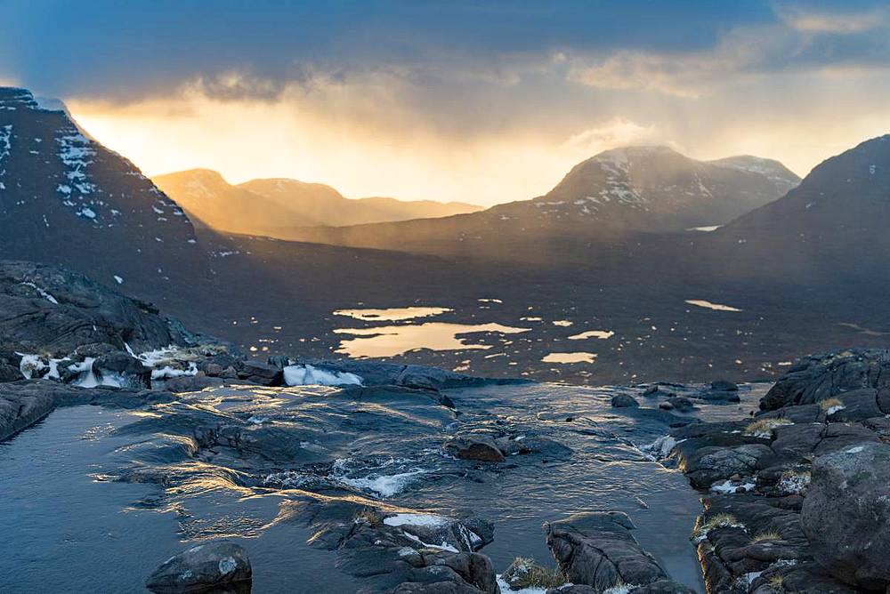 Hiking in the Scottish Highlands in Torridon along The Cape Wrath Trail near Loch Coire Mhic Fhearchair, Highlands, Scotland, United Kingdom, Europe