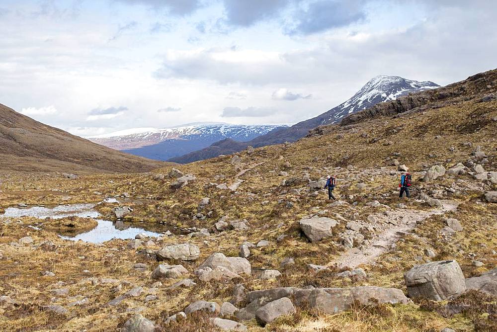 Hiking in the Scottish Highlands in Torridon along The Cape Wrath Trail towards Loch Coire Mhic Fhearchair, Highlands, Scotland, United Kingdom, Europe