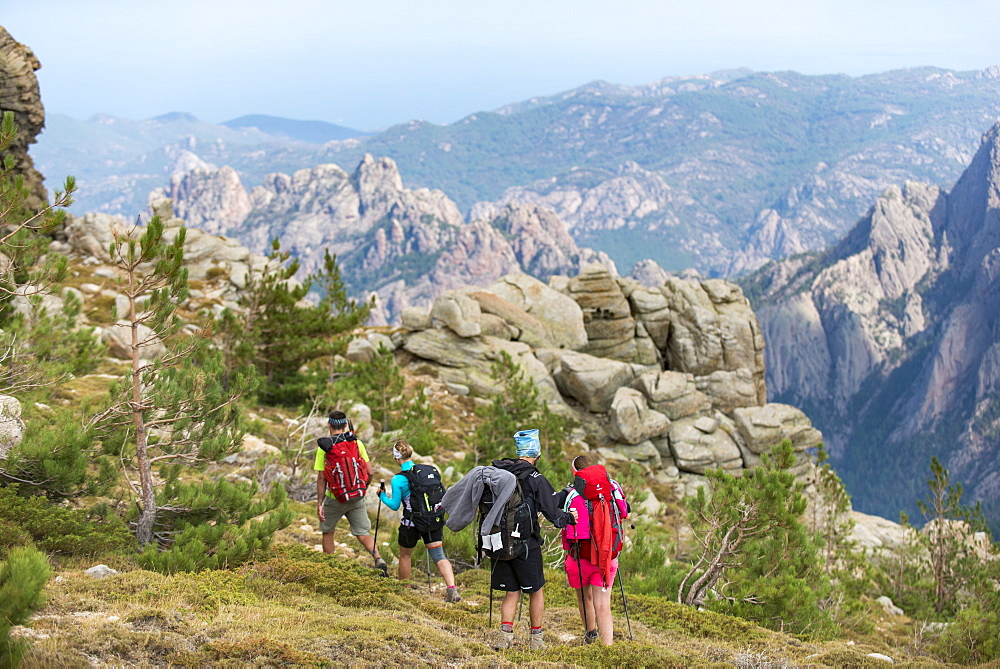 Trekking on the GR20 in Corsica near the Aiguilles de Bavella hiking towards Refuge d'Asinao, Corsica, France, Mediterranean, Europe